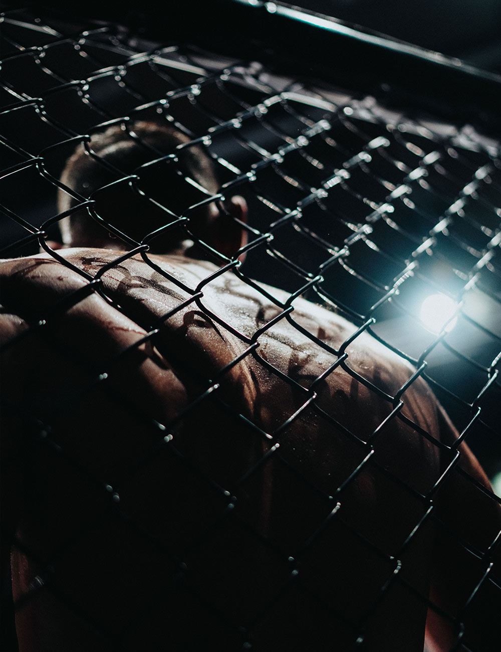 Mixed martial arts fighter in the octagon, First Round Management MMA management division