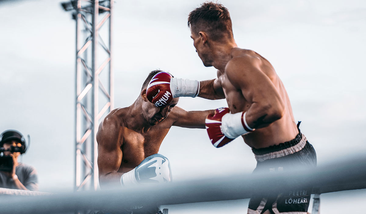 Boxer in the ring, First Round Management boxing division