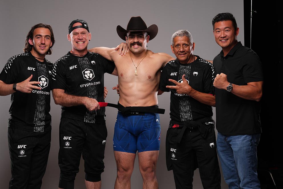 Luis hernandez and corner with manager backstage after ufc debut